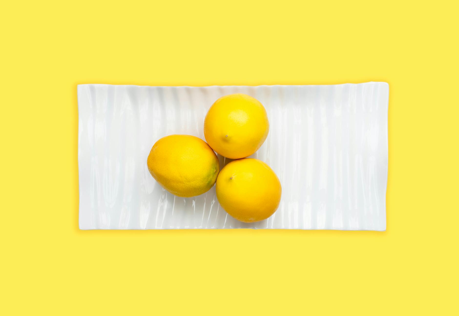 Fresh lemons arranged against a bright background, symbolizing renewed vitality after loss
